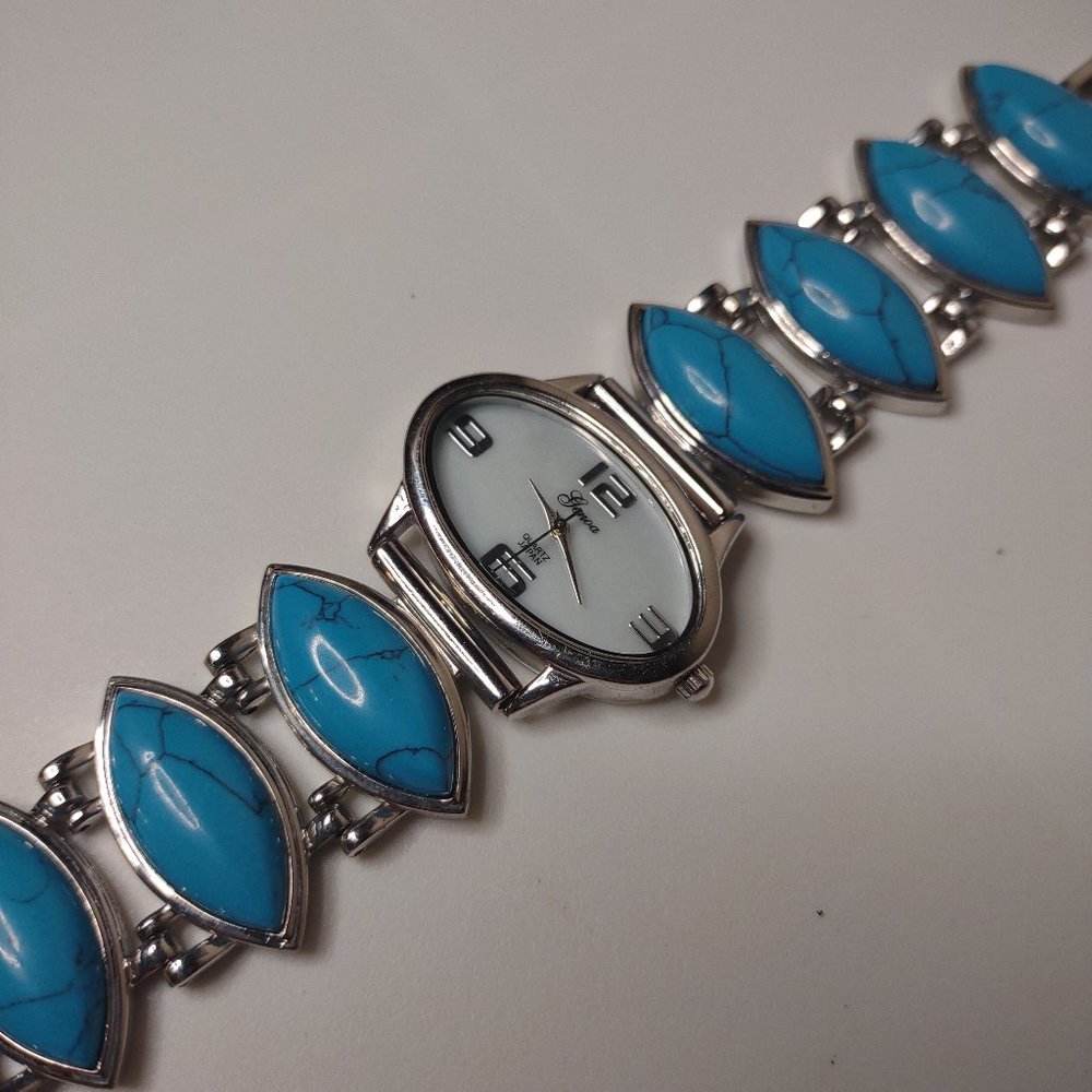Silver Tone Metal And Blue Plastic Watch